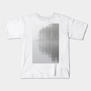 Trees reflection at lake foggy morning Kids T-Shirt